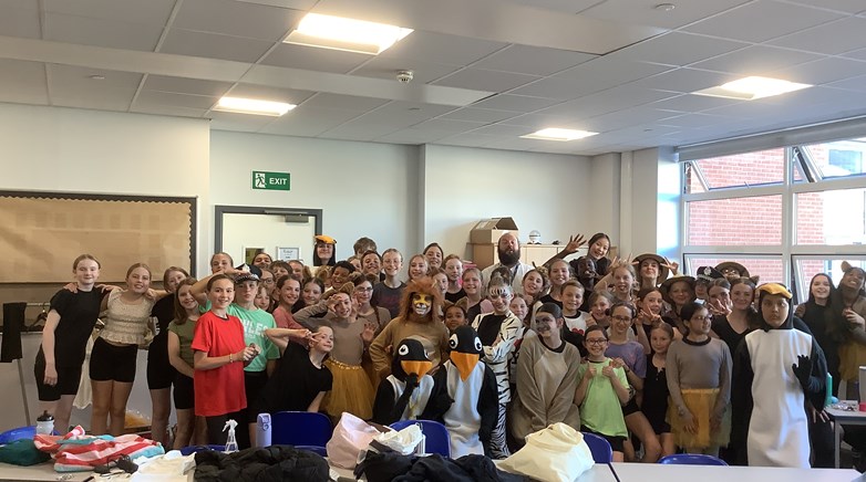 Images of the cast of Madagascar Jr school drama club performance